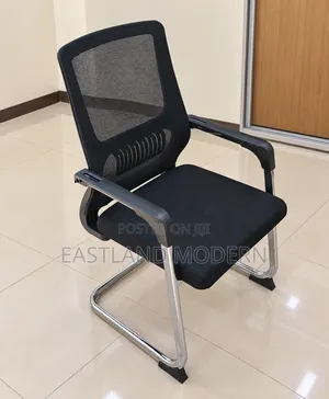 Black Mesh Visitor Chair With Padded Seat and Chrome Sled Base