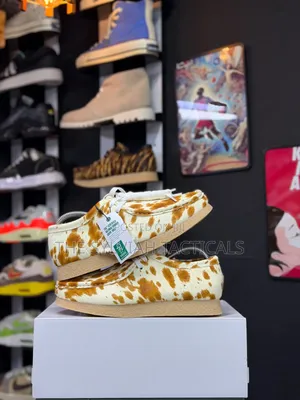 Clarks Originals Wallabee Shoes in a Tan and White Cow-Print Hair