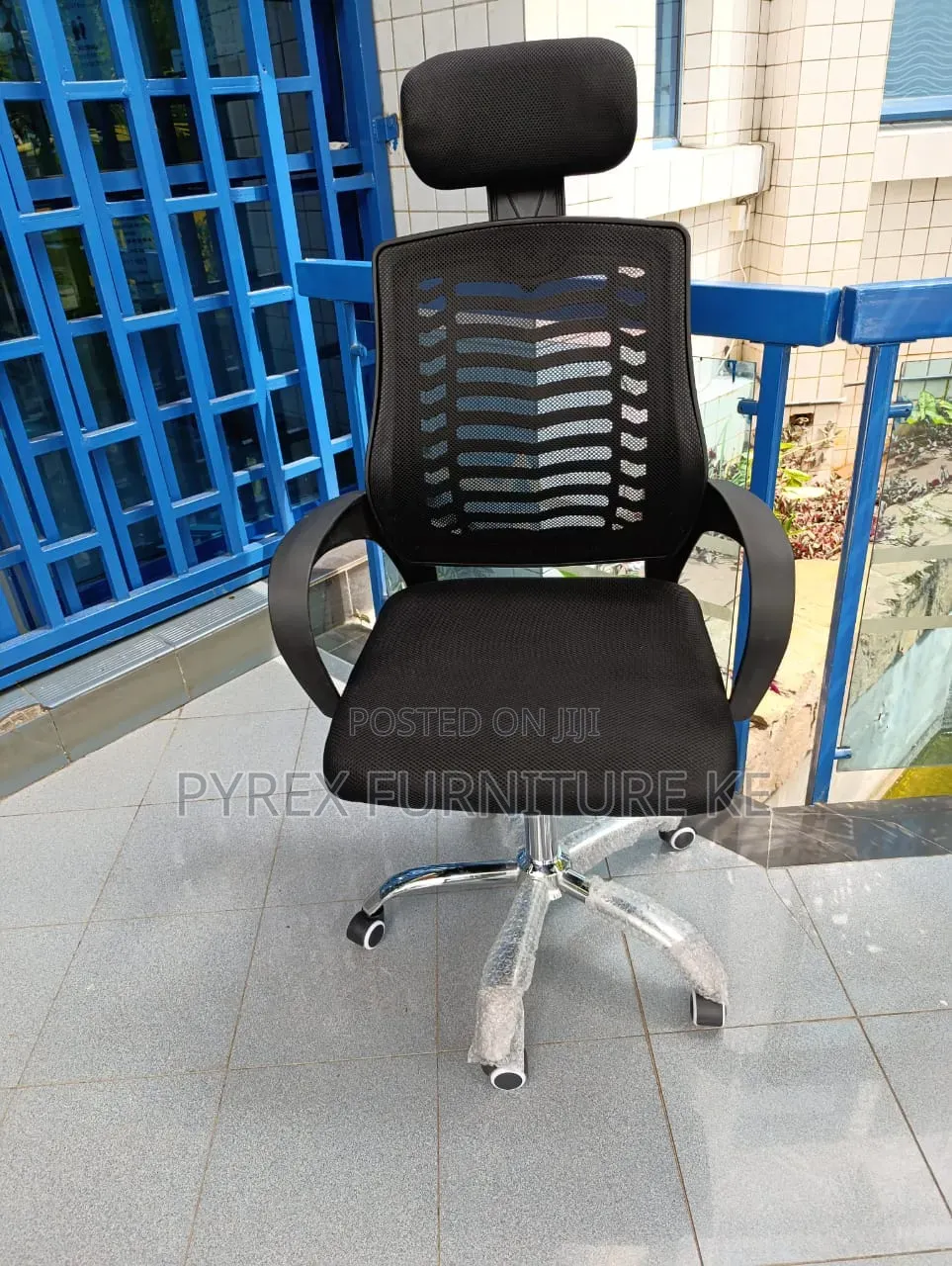 Office Chair With a Headrest and a Breathable Mesh