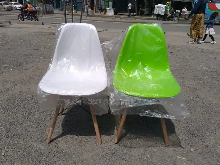 White/Green Eams Chairs