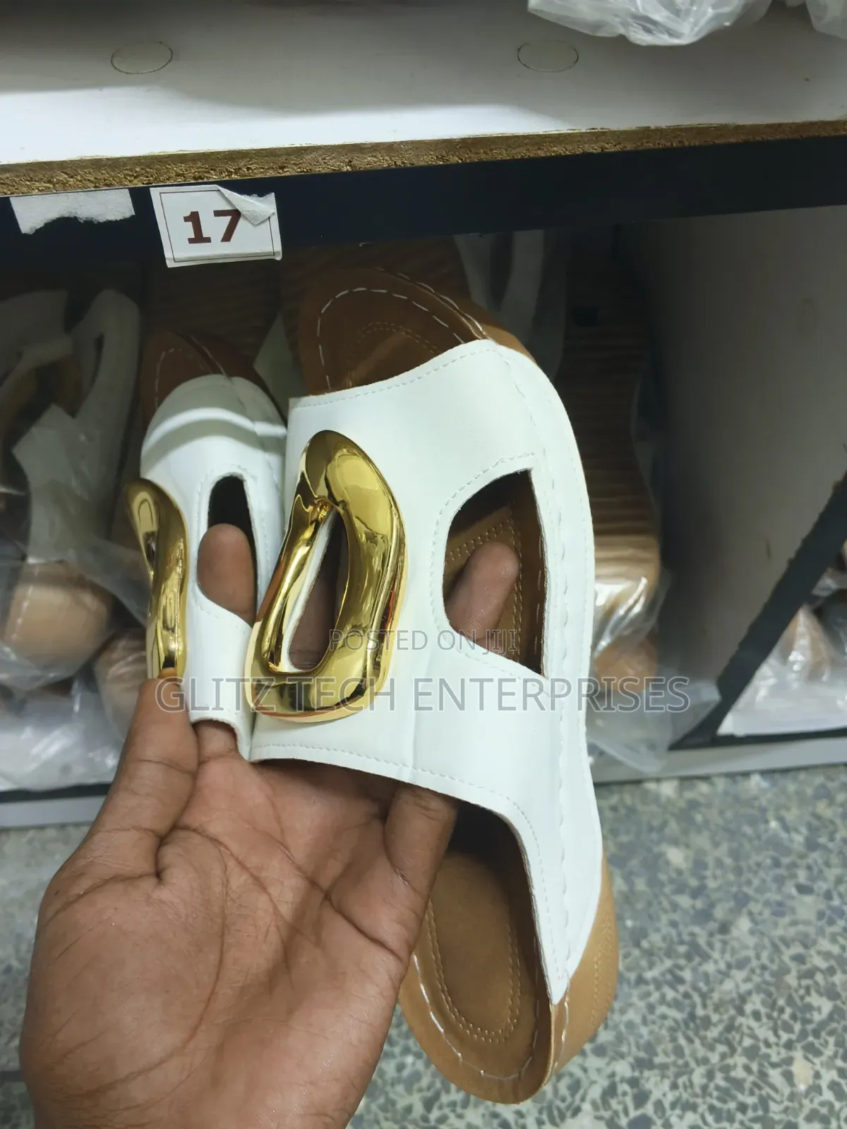 Ladies’ White Open-Toe Slide Sandals With Gold Buckle Accent