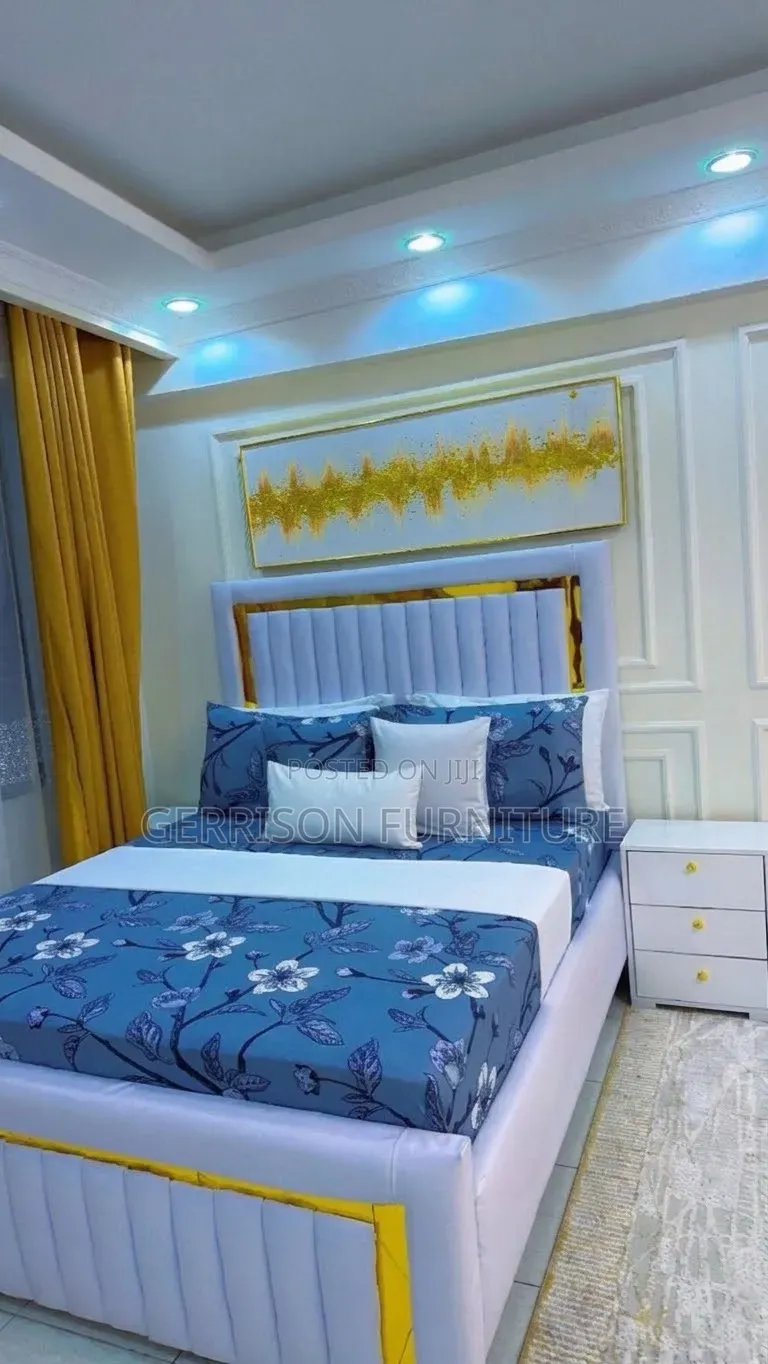 ​Luxury White Vertical Channel-Tufted Bed Frame With Gold Accents