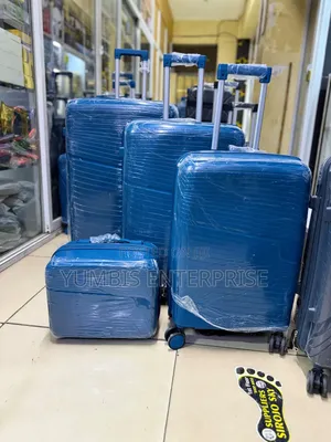 XL Set Size 30" 4 in 1 Rubber Suitcase Set in Turquoise Blue at 9,000
