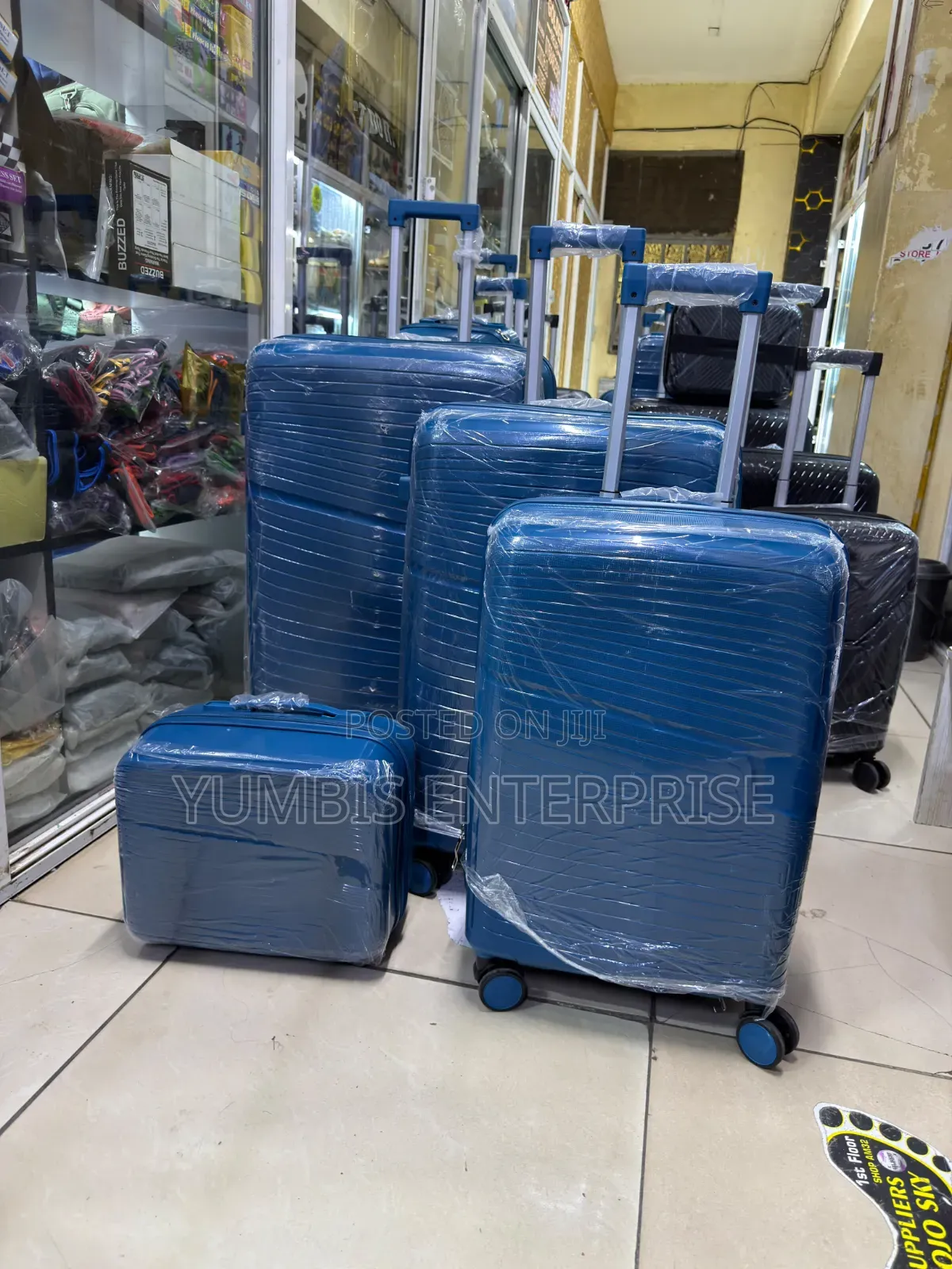 XL Set Size 30" 4 in 1 Rubber Suitcase Set in Turquoise Blue at 9,000