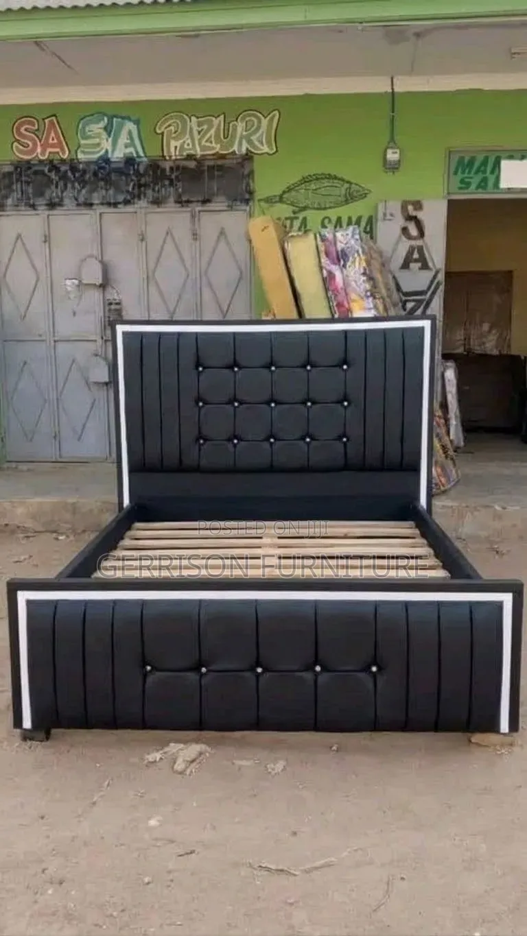Executive Black Tufted Upholstered Bed Frame With White Border