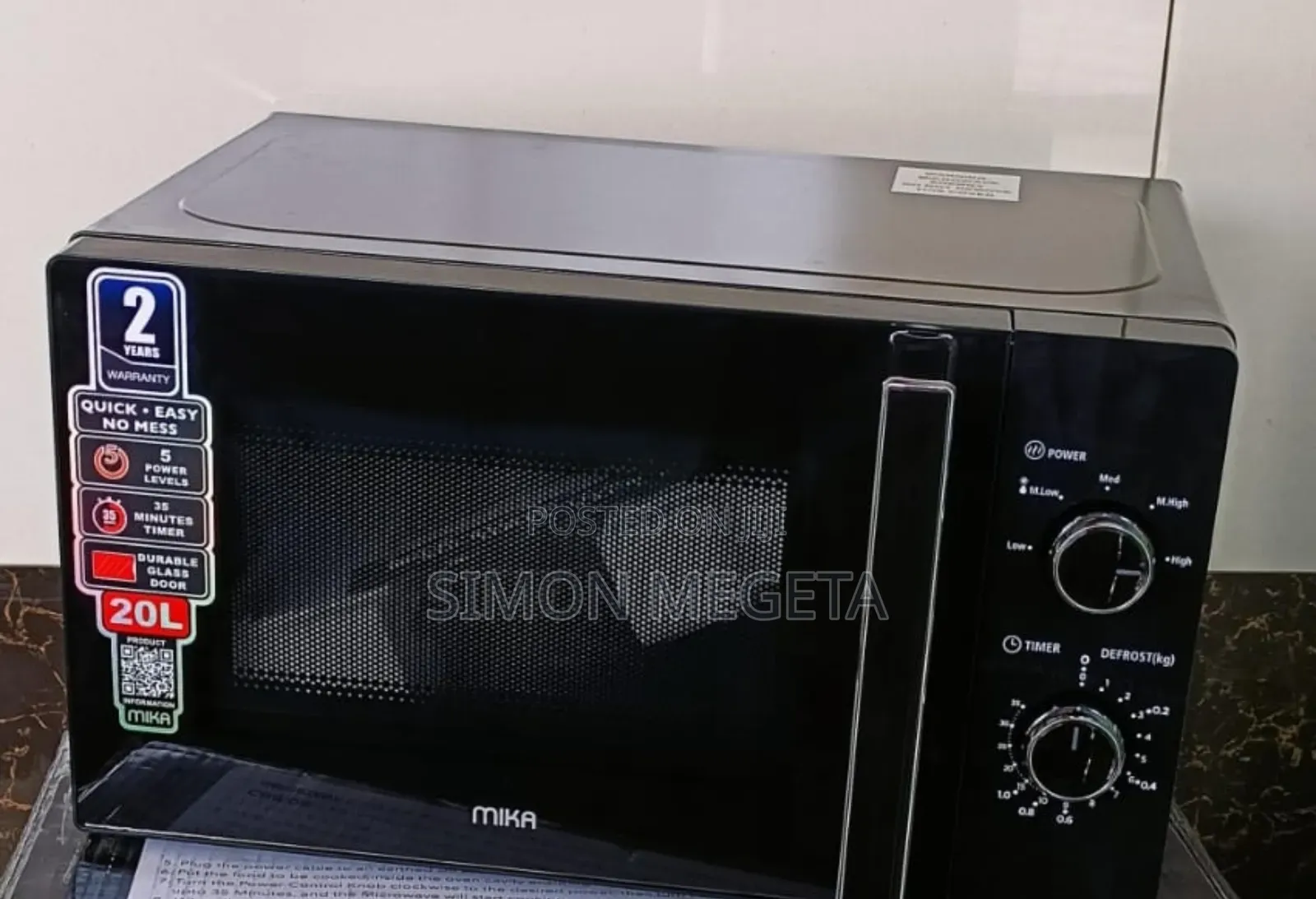Black 20 Litres Mika Manual Microwave