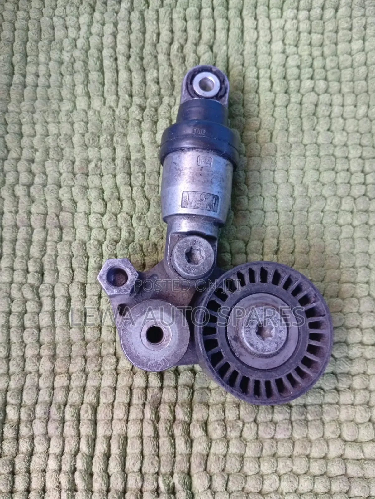This Is Tensioner for Mazda Demio
