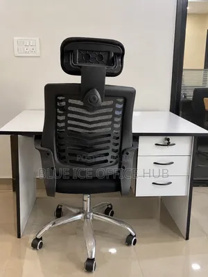 White Office Desk With Black Ergonomic Mesh Chair