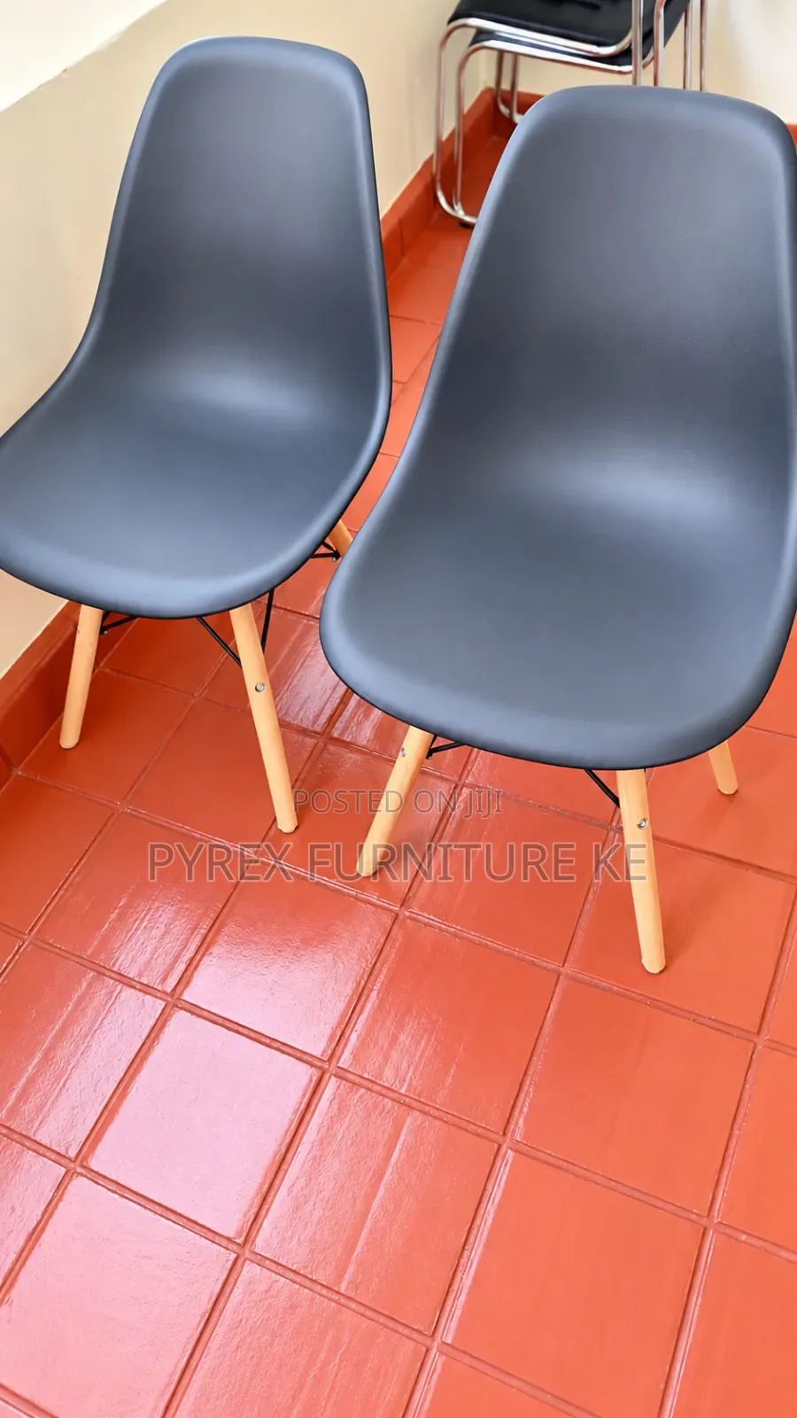 Black Molded Plastic Chairs With Wooden Legs