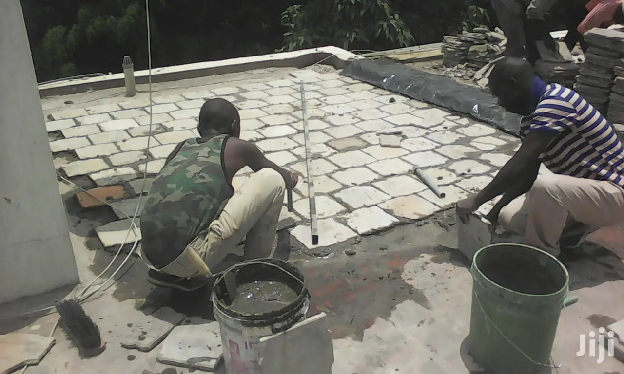 Laying Of Paving Slab.